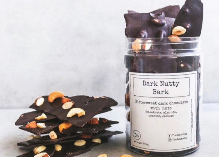 Luxurious dark nutty chocolate bark by The Kakao Guy. Perfect for gifting.
Experience the allure of smooth dark chocolate with a satisfying blend of premium roasted nuts, delivering a symphony of complex and indulgent flavours.