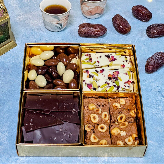 The best collection of 4 desserts in 1 box. For those who want everything delicious in a box. Contains a mix of chocolate bark, dragees and brownies.