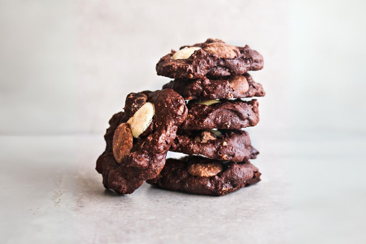 Moist flourless chocolate cookies, by The Kakao Guy. An exquisite blend of rich, triple-chocolate goodness, combined with the wholesome crunch of walnuts and almonds - making each bite a symphony of flavour and texture.